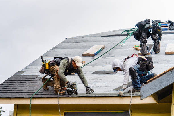 Professional Gutter Installation technician working in Wingate, IN